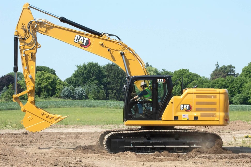 CAHill-Milton-CAT-Excavator-on-the-field