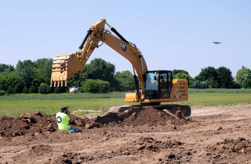 CAHill-TECH-video-producer-recording-excavator